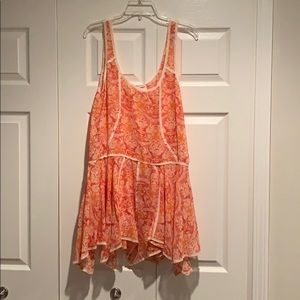 Free People mini dress in orange hues.